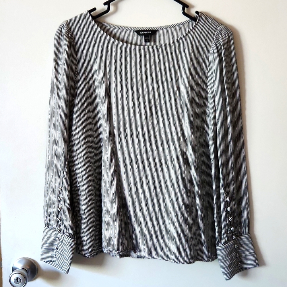 Medium Express blouse with gray and silver colors has a boatneck.